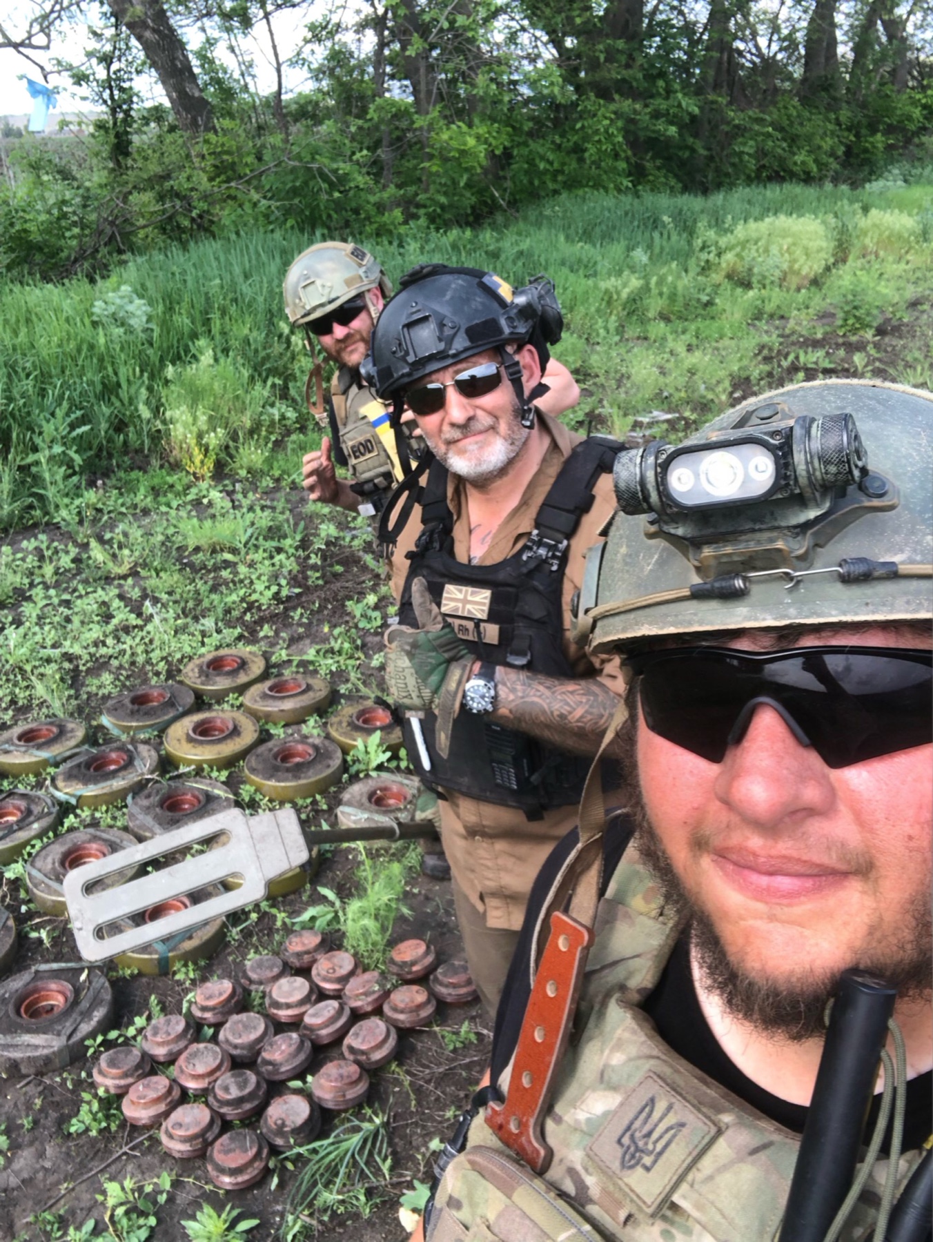 IGR team members documenting landmines identified during field operations in Ukraine