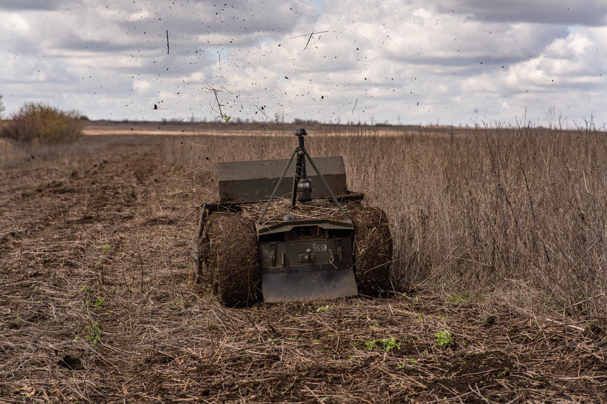 A Rovertech Zmiy robotic clearance system operating in a field