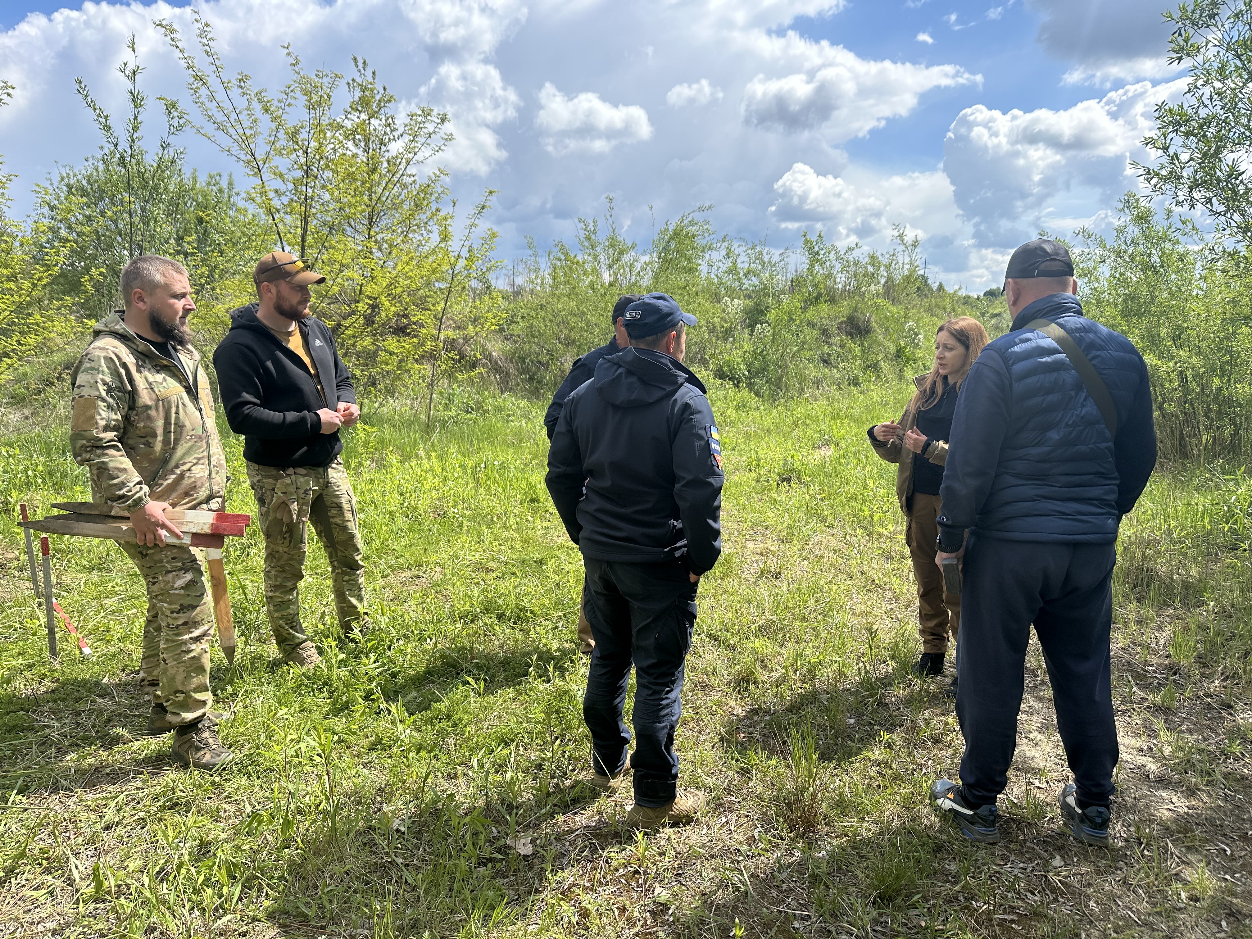 Personnel gathered for a field briefing in Ukraine