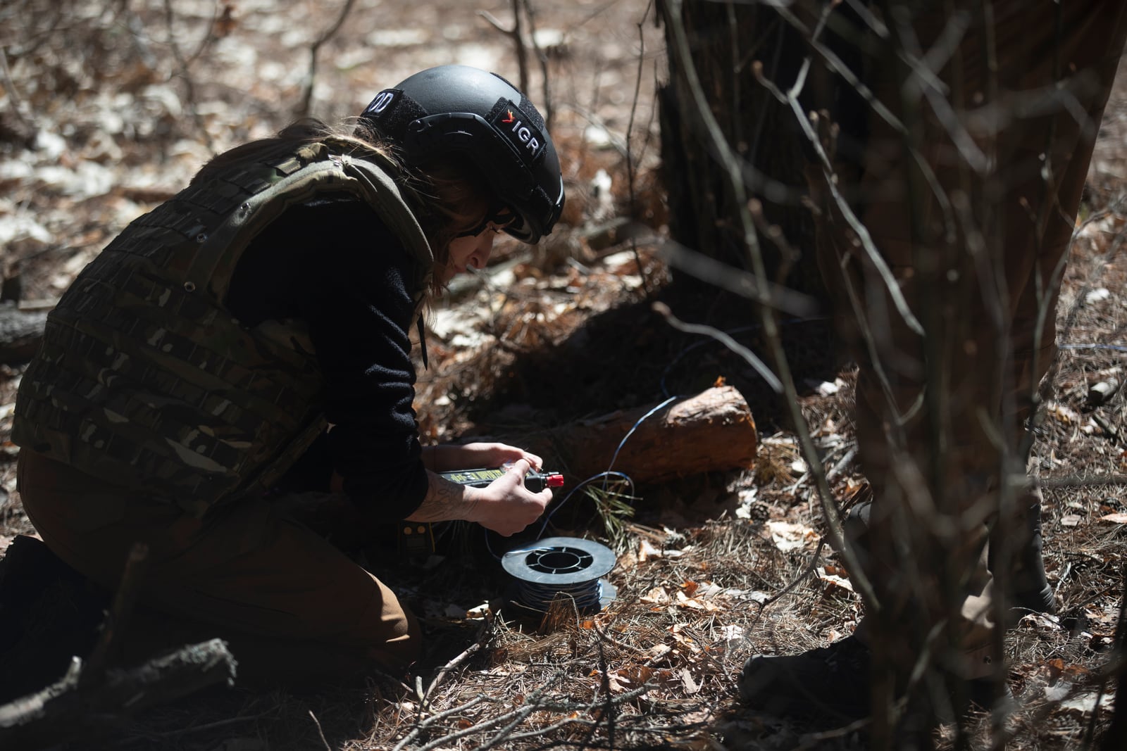 An IGR team member conducting technical fieldwork in Ukraine